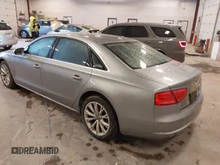 2012 Audi A8 with VIN WAURVAFD7CN021716, listed as a IAAI auction lot 42330229 with 97,359 mi miles and . Bid and sale history available at DreamBid. Image 3.