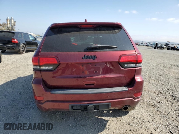 2020 Jeep Grand Cherokee Laredo E with VIN 1C4RJEAG2LC379633, listed as a Copart auction lot 58437555 with 57,219 mi miles and Salvage title. Bid and sale history available at DreamBid. Image 6.