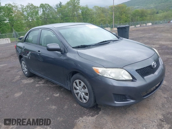 2009 Toyota Corolla with VIN JTDBL40E999048446, listed as a IAAI auction lot 42210822 with 260,005 mi miles. Bid and sale history available at carsss.com. Image 1.