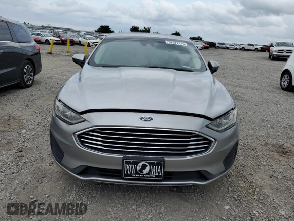 2020 Ford Fusion SE with VIN 3FA6P0HDXLR113882, listed as a Copart auction lot 57677215 with 104,459 mi miles and Salvage title. Bid and sale history available at DreamBid. Image 5.