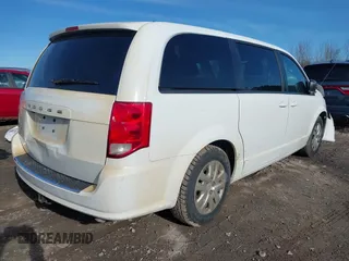 2018 Dodge Grand Caravan SE Plus with VIN 2C4RDGBG0JR138241, listed as a IAAI auction lot 41962762 with 125,644 mi miles and . Bid and sale history available at DreamBid. Image 4.
