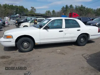 2000 Ford Crown Victoria Police Interceptor z VIN 2FAFP71W6YX169248, wystawiony jako IAAI lot #41974053 z przebiegiem 230 658 mil mil oraz . Historia ofert i sprzedaży dostępna na DreamBid. Obrazek 14.