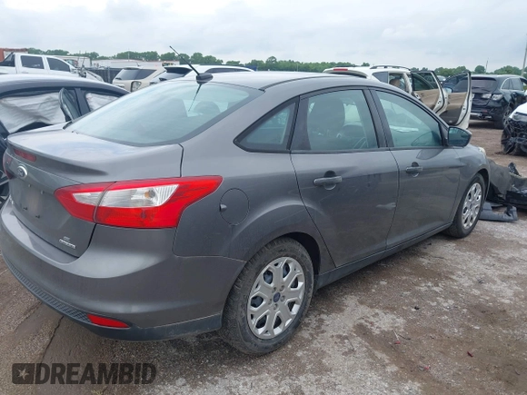 2012 Ford Focus SE z VIN 1FAHP3F2XCL430734, wystawiony jako IAAI lot #42469084 z przebiegiem 128 168 mil mil oraz . Historia ofert i sprzedaży dostępna na DreamBid. Obrazek 4.