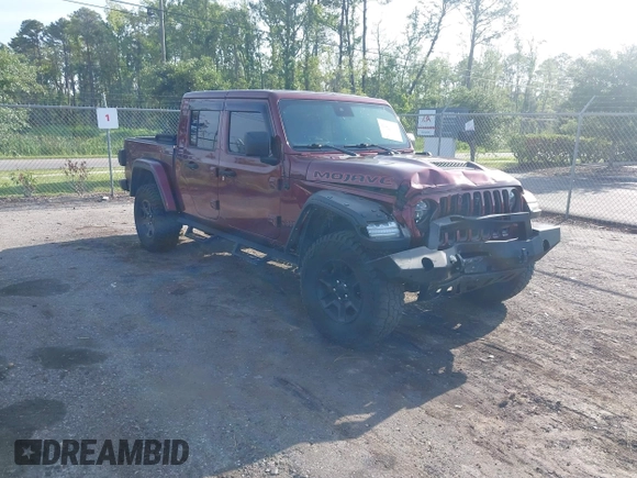2021 Jeep Gladiator Mojave with VIN 1C6JJTEG8ML592381, listed as a IAAI auction lot 42369581 with 75,295 mi miles and . Bid and sale history available at DreamBid. Image 1.