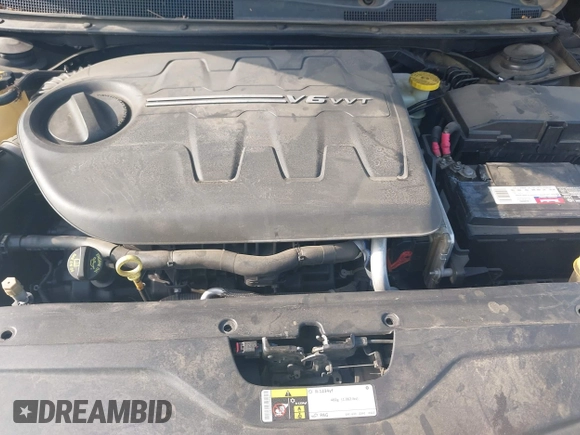 2015 Chrysler 200 S with VIN 1C3CCCBG7FN706964, listed as a IAAI auction lot 42117445 with 144,286 mi miles and . Bid and sale history available at DreamBid. Image 10.