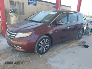2014 Honda Odyssey Touring with VIN 5FNRL5H90EB080889, listed as a IAAI auction lot 42085305 with 123,286 mi miles and . Bid and sale history available at carsss.com. Image 17.