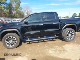 2023 GMC Canyon 4WD Denali with VIN 1GTP6FEK9P1146606, listed as a IAAI auction lot 41330983 with 18,907 mi miles and . Bid and sale history available at DreamBid. Image 14.