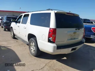 2011 Chevrolet Suburban LT with VIN 1GNSCJE06BR309881, listed as a IAAI auction lot 42577452 with 254,073 mi miles and . Bid and sale history available at DreamBid. Image 3.