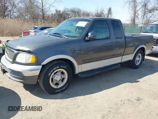 2003 Ford F-150 XL with VIN 1FTRX17L33NB61748, listed as a IAAI auction lot 41789730 with 301,092 mi miles. Bid and sale history available at carsss.com. Image 2.