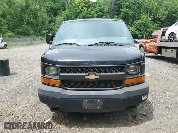 2015 Chevrolet Express Passenger LS with VIN 1GAWGPFG0F1141701, listed as a Copart auction lot 62818685 with 63,219 mi miles and Salvage title. Bid and sale history available at DreamBid. Image 5.