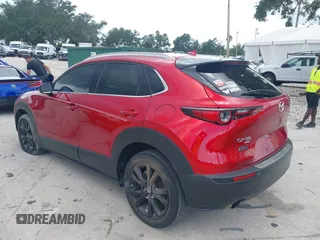 2023 Mazda CX-30 Premium с VIN 3MVDMBDY3PM507398, выставлен на аукционе IAAI как лот 42533176 с пробегом 15 788 миль миль и . История ставок и продаж доступна на DreamBid. Изображение 3.
