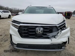 2025 Honda Pilot Elite with VIN 5FNYG1H82SB058680, listed as a Copart auction lot 42996425 with 9,890 mi miles and Salvage Title. Bid and sale history available at DreamBid. Image 5.