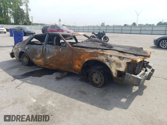 1985 Cadillac Seville z VIN 1G6KS6988FE825863, wystawiony jako Copart lot #52723115 z przebiegiem Nie podano mil oraz Szkoda całkowita • Salvage title. Historia ofert i sprzedaży dostępna na DreamBid. Obrazek 4.