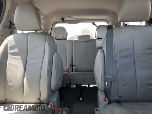 2013 Toyota Sienna XLE AAS с VIN 5TDYK3DC1DS349139, выставлен на аукционе Copart как лот 64239914 с пробегом 127 874 миль миль и Списание • Salvage title. История ставок и продаж доступна на DreamBid. Изображение 10.