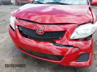 2009 Toyota Corolla with VIN 2T1BU40E09C170961, listed as a IAAI auction lot 42033860 with 192,899 mi miles and . Bid and sale history available at DreamBid. Image 6.