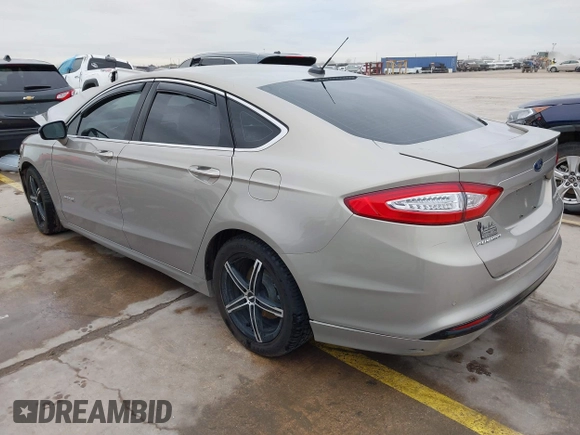 2016 Ford Fusion Titanium Hybrid with VIN 3FA6P0RU9GR143203, listed as a IAAI auction lot 41332144 with 94,357 mi miles. Bid and sale history available at carsss.com. Image 3.