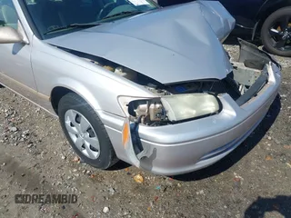 2001 Toyota Camry CE z VIN 4T1BG22K01U053432, wystawiony jako IAAI lot #42257822 z przebiegiem 128 610 mil mil oraz . Historia ofert i sprzedaży dostępna na DreamBid. Obrazek 19.