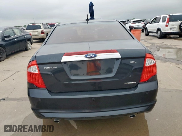 2012 Ford Fusion SEL z VIN 3FAHP0JGXCR426220, wystawiony jako Copart lot #59346985 z przebiegiem 151 397 mil mil oraz Szkoda całkowita • Salvage title. Historia ofert i sprzedaży dostępna na DreamBid. Obrazek 6.