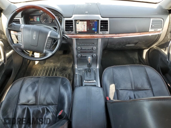 2012 Lincoln MKZ Hybrid z VIN 3LNDL2L33CR812788, wystawiony jako Copart lot #61068125 z przebiegiem 246 016 mil mil oraz Szkoda całkowita • Salvage title. Historia ofert i sprzedaży dostępna na DreamBid. Obrazek 8.