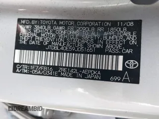 2009 Toyota Corolla with VIN JTDBL40E59J051651, listed as a IAAI auction lot 41874710 with 52,938 mi miles. Bid and sale history available at carsss.com. Image 9.