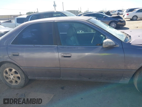 1998 Toyota Camry LE z VIN JT2BF22K6W0117441, wystawiony jako IAAI lot #41720451 z przebiegiem Nie podano mil oraz . Historia ofert i sprzedaży dostępna na DreamBid. Obrazek 13.