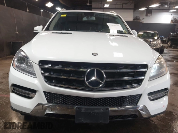2014 Mercedes-Benz M 350 z VIN 4JGDA5HB4EA335552, wystawiony jako IAAI lot #41710609 z przebiegiem 156 523 mil mil oraz . Historia ofert i sprzedaży dostępna na DreamBid. Obrazek 6.