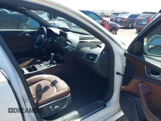 2016 Audi A6 2.0T Premium Plus with VIN WAUGFAFC4GN045229, listed as a IAAI auction lot 41974532 with 122,585 mi miles. Bid and sale history available at carsss.com. Image 5.