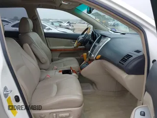 2007 Lexus RX 400h z VIN JTJGW31U572003651, wystawiony jako IAAI lot #42163515 z przebiegiem 358 648 mil mil oraz . Historia ofert i sprzedaży dostępna na DreamBid. Obrazek 5.