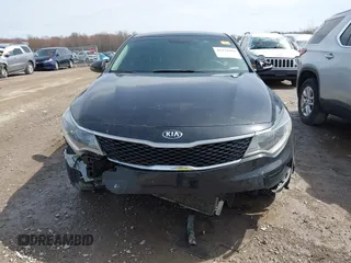 2016 Kia Optima LX with VIN KNAGT4L34G5110742, listed as a IAAI auction lot 41931969 with 128,458 mi miles. Bid and sale history available at carsss.com. Image 13.