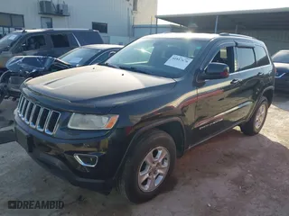2014 Jeep Grand Cherokee Laredo with VIN 1C4RJEAG4EC136764, listed as a IAAI auction lot 41817676 with 133,943 mi miles. Bid and sale history available at carsss.com. Image 17.