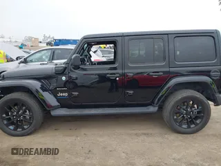 2023 Jeep Wrangler Sahara z VIN 1C4JJXP6XPW556327, wystawiony jako IAAI lot #41784532 z przebiegiem 39 918 mil mil oraz . Historia ofert i sprzedaży dostępna na DreamBid. Obrazek 14.