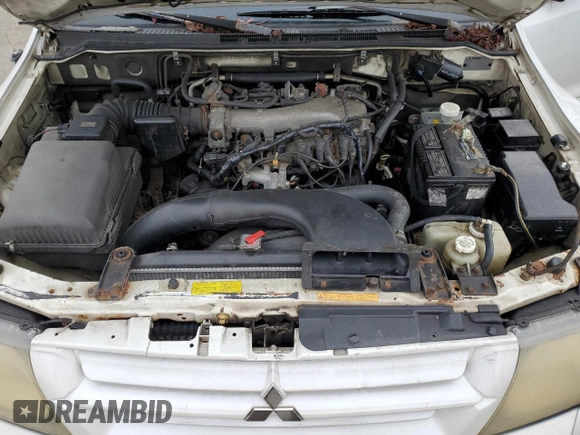2002 Mitsubishi Montero Limited z VIN JA4MW51R52J027289, wystawiony jako Copart lot #71921024 z przebiegiem 199 334 mil mil oraz Czysty tytuł • Clean title. Historia ofert i sprzedaży dostępna na DreamBid. Obrazek 12.