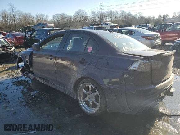 2014 Mitsubishi Lancer Evolution GSR z VIN JA32W8FV6EU010233, wystawiony jako Copart lot #42787275 z przebiegiem 74 780 mil mil oraz Szkody całkowita. Historia ofert i sprzedaży dostępna na DreamBid. Obrazek 2.