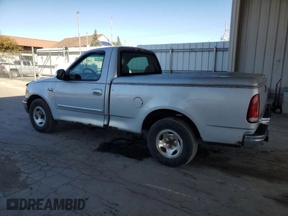 1999 Ford F-150 XL with VIN 1FTRF17L7XNA73732, listed as a Copart auction lot 74388514 with Not provided miles and Clean title. Bid and sale history available at DreamBid. Image 2.