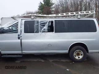 2014 Chevrolet Express Passenger LT z VIN 1GAZG1FG4E1123310, wystawiony jako IAAI lot #41775930 z przebiegiem 199 807 mil mil oraz . Historia ofert i sprzedaży dostępna na DreamBid. Obrazek 13.
