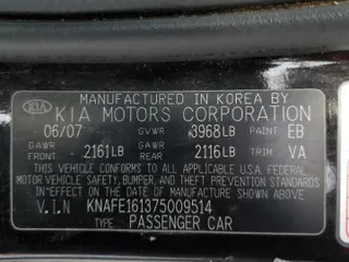 2007 Kia Spectra with VIN KNAFE161375009514, listed as a Copart auction lot 51656405 with 137,418 mi miles and Salvage Title. Bid and sale history available at carsss.com. Image 12.
