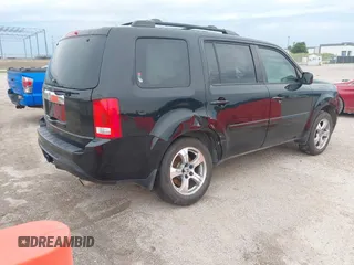 2013 Honda Pilot EX-L with VIN 5FNYF3H50DB042467, listed as a IAAI auction lot 42260597 with 165,836 mi miles and . Bid and sale history available at DreamBid. Image 4.