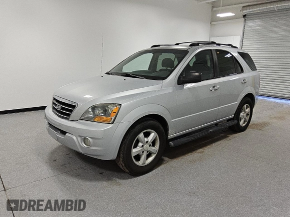 2007 Kia Sorento LX z VIN KNDJD736075700860, wystawiony jako Copart lot #82119114 z przebiegiem 290 641 mil mil oraz Czysty tytuł • Clean title. Historia ofert i sprzedaży dostępna na DreamBid. Obrazek 1.