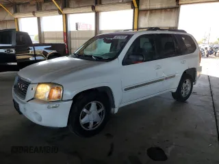 2002 GMC Envoy SLT with VIN 1GKDT13S922128924, listed as a Copart auction lot 46131035 with 162,499 mi miles and Salvage Title. Bid and sale history available at carsss.com. Image 1.