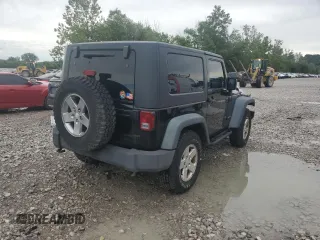 2010 Jeep Wrangler Rubicon with VIN 1J4BA6D14AL198524, listed as a Copart auction lot 65260235 with Not provided miles and Clean title. Bid and sale history available at DreamBid. Image 3.