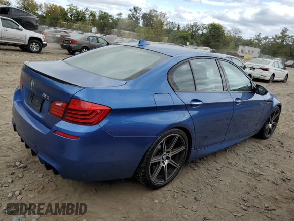 2014 BMW M5 z VIN WBSFV9C5XED097563, wystawiony jako Copart lot #72175354 z przebiegiem 73 406 mil mil oraz Szkody całkowita. Historia ofert i sprzedaży dostępna na DreamBid. Obrazek 3.