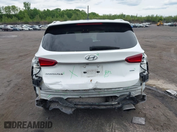2019 Hyundai Santa Fe SE z VIN 5NMS2CADXKH005960, wystawiony jako IAAI lot #42341142 z przebiegiem 71 617 mil mil oraz . Historia ofert i sprzedaży dostępna na DreamBid. Obrazek 6.