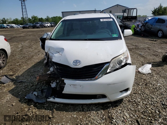 2014 Toyota Sienna LE AAS with VIN 5TDKK3DC6ES497746, listed as a Copart auction lot 56125845 with 142,596 mi miles and Salvage Title. Bid and sale history available at DreamBid. Image 5.