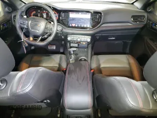 2025 Dodge Durango GT Plus with VIN 1C4RDJDG5SC506983, listed as a Copart auction lot 82427384 with 1,404 mi miles and Salvage title. Bid and sale history available at DreamBid. Image 8.