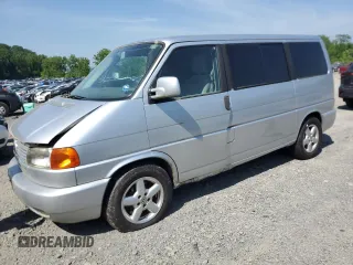 2003 Volkswagen EuroVan MV с VIN WV2MB47023H005958, выставлен на аукционе Copart как лот 59537525 с пробегом 230 145 миль миль и Чистый • Clean title. История ставок и продаж доступна на DreamBid. Изображение 1.