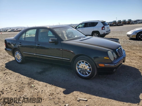2001 Mercedes-Benz E-Class with VIN WDBJF65J51B386619, listed as a Copart auction lot 46623515 with 108,209 mi miles and Salvage Title. Bid and sale history available at carsss.com. Image 4.