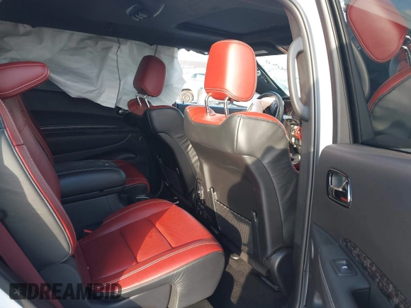2023 Dodge Durango SRT 392 Premium with VIN 1C4SDJGJ3PC668238, listed as a IAAI auction lot 41305050 with 5,099 mi miles and . Bid and sale history available at DreamBid. Image 8.