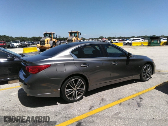 2015 Infiniti Q50 Premium z VIN JN1BV7AR3FM390743, wystawiony jako IAAI lot #41990093 z przebiegiem 91 350 mil mil oraz . Historia ofert i sprzedaży dostępna na DreamBid. Obrazek 13.