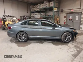2021 Volkswagen Jetta S z VIN 3VWC57BU8MM102850, wystawiony jako IAAI lot #41856714 z przebiegiem 40 754 mil mil oraz . Historia ofert i sprzedaży dostępna na DreamBid. Obrazek 12.