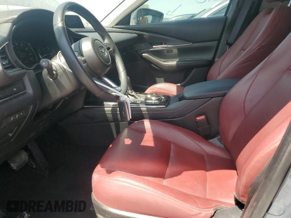 2023 Mazda CX-30 S Carbon Edition z VIN 3MVDMBCM2PM524384, wystawiony jako Copart lot #62699155 z przebiegiem 25 765 mil mil oraz Szkoda całkowita • Salvage title. Historia ofert i sprzedaży dostępna na DreamBid. Obrazek 7.